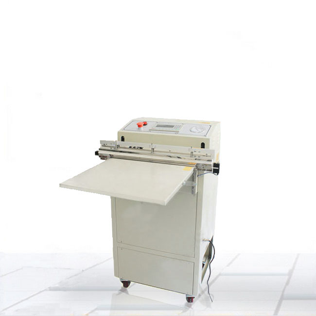 上海某公司購買了我司一臺電子芯片外抽式真空包裝機